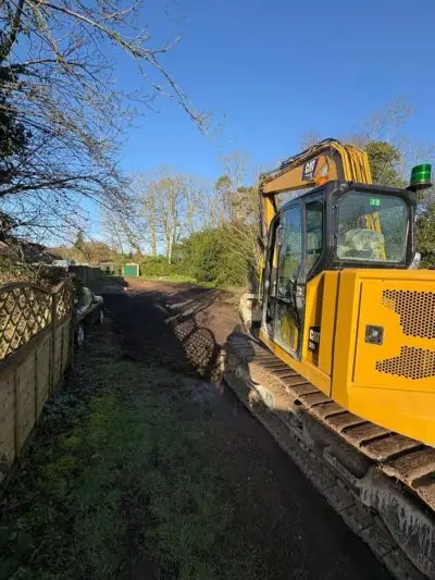 In and out 1 day 
Parking area levelled and road planning down.  💪